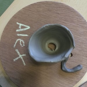 clay pot made on potter's wheel by early years children