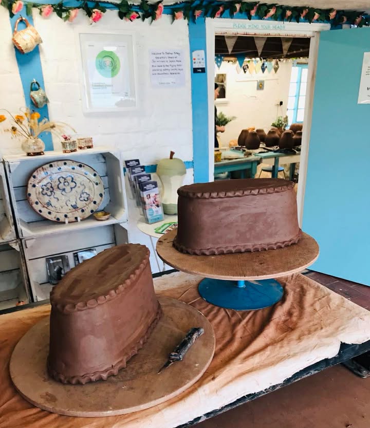 Two large oval wet clay flower bricks. They have yet to have hole cut in the top and are awaiting decoration.