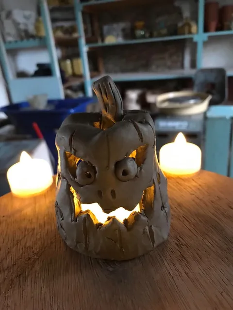 Mini tealight lantern made from clay in the style of a pumpkin